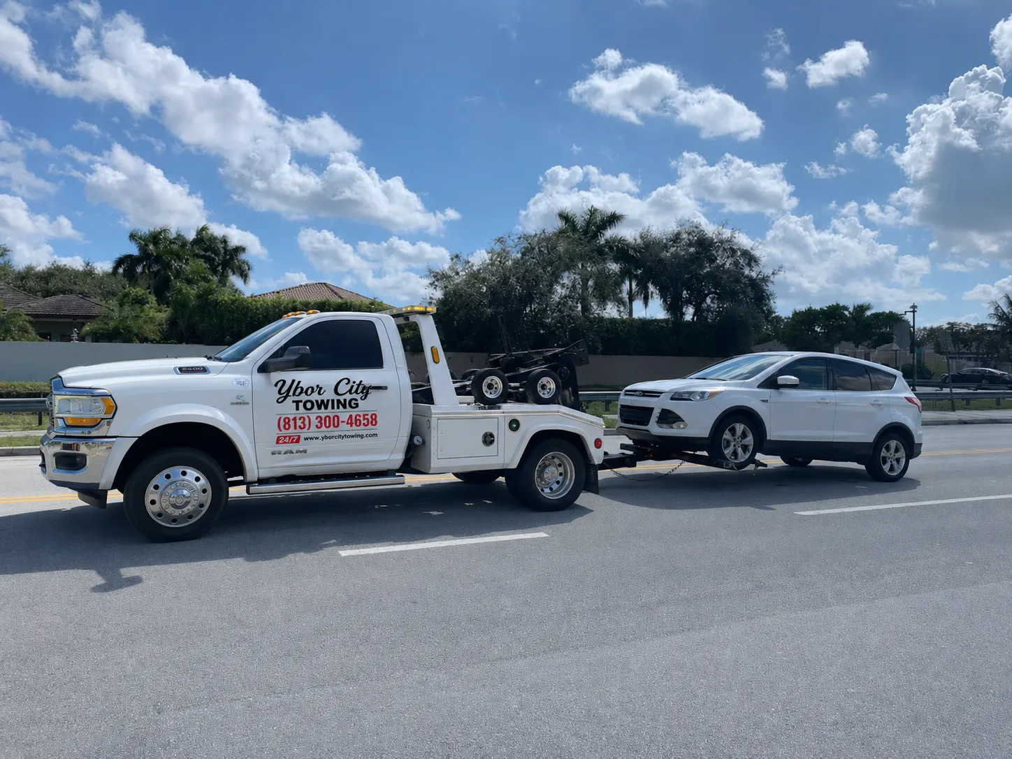 Tow truck securing a customer's car in Tampa, Florida