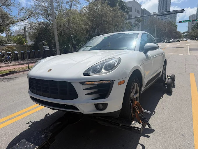 Ybor City Towing job photo — vehicle loaded for towing in Tampa, FL